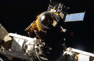 The Mir Space Station, viewed from the Orbiter Endeavour during STS-89. Docking Module and docking target in view.